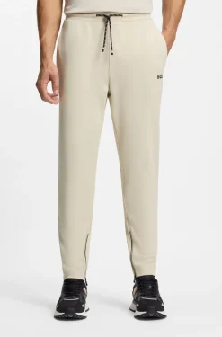 Active Stretch-gabardine tracksuit bottoms with zipped hems