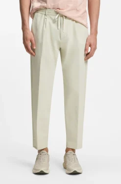 Active tapered-fit trousers in water-repellent stretch fabric
