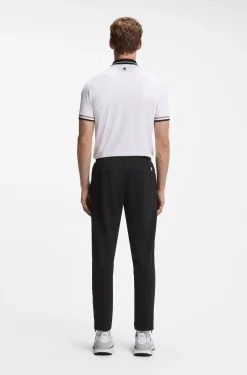 Active tracksuit bottoms in thermoregulating stretch gabardine
