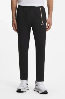Active tracksuit bottoms in thermoregulating stretch gabardine