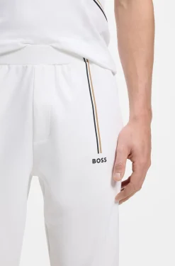 Active tracksuit bottoms in thermoregulating stretch gabardine