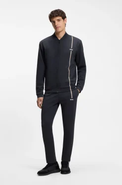 Active tracksuit bottoms in thermoregulating stretch gabardine