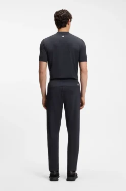 Active tracksuit bottoms in thermoregulating stretch gabardine