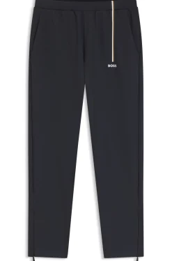 Active tracksuit bottoms in thermoregulating stretch gabardine
