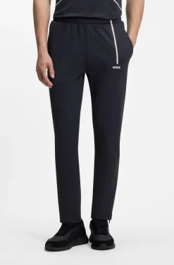 Active tracksuit bottoms in thermoregulating stretch gabardine