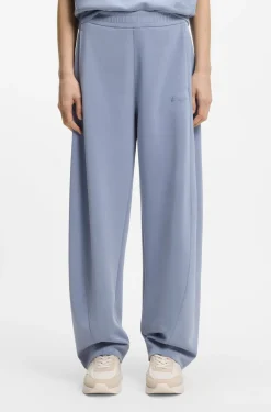Balloon-fit tracksuit bottoms with logo embroidery
