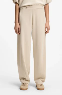 Balloon-fit tracksuit bottoms with logo embroidery