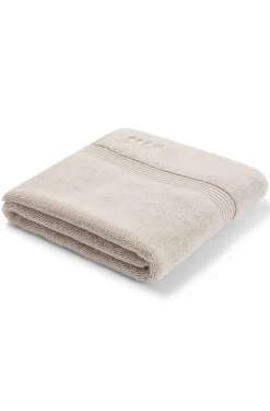 Beige Aegean-cotton bath mat with tonal logo