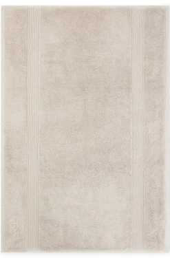 Beige Aegean-cotton bath mat with tonal logo