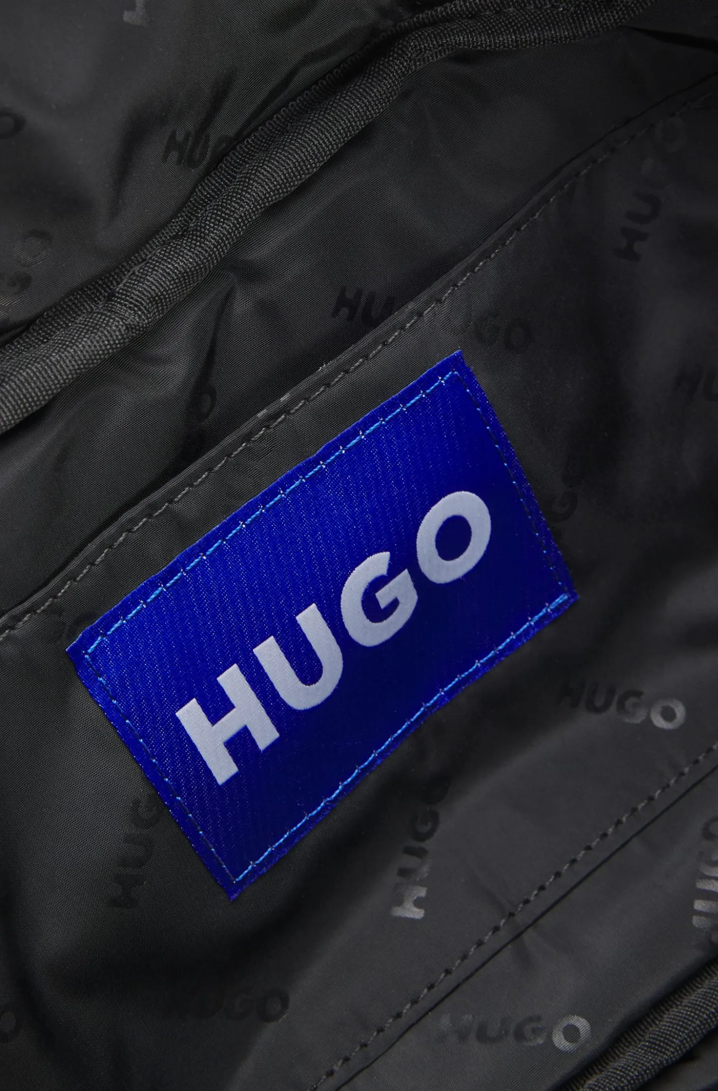 Belt bag with blue logo label