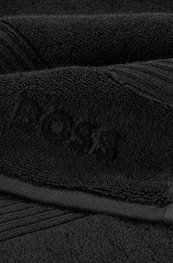 Black cotton bath sheet with tonal embroidered logo