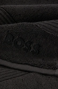 Black cotton bath towel with embroidered logo