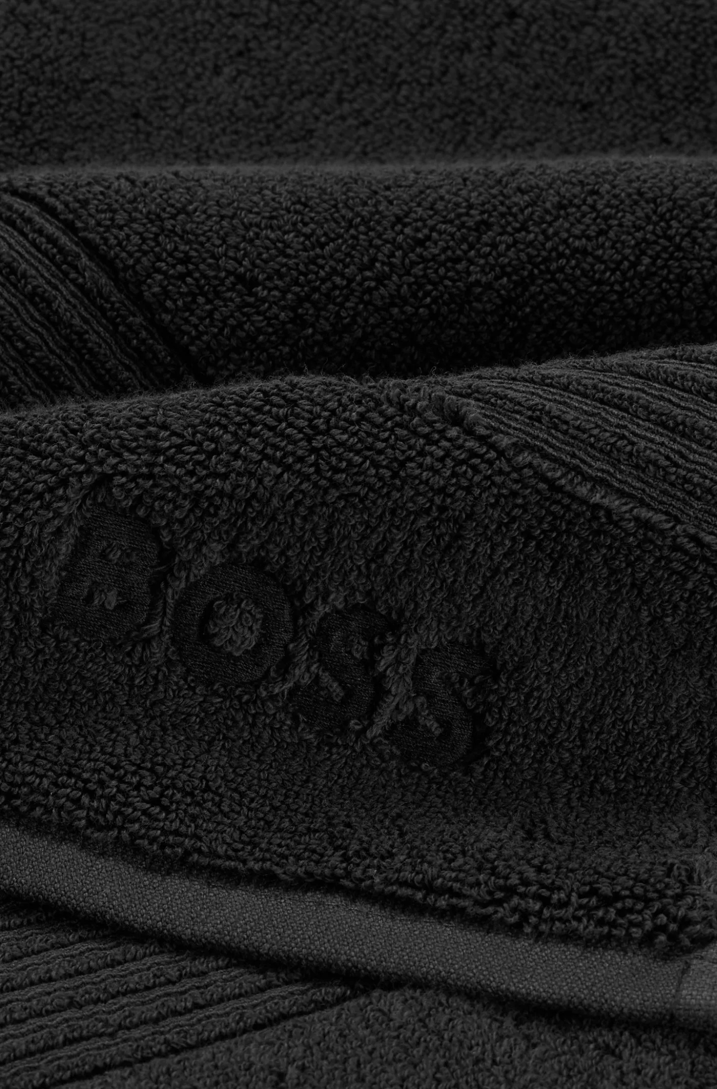 Black cotton hand towel with embroidered logo