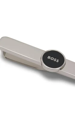Brass tie clip with round logo detail