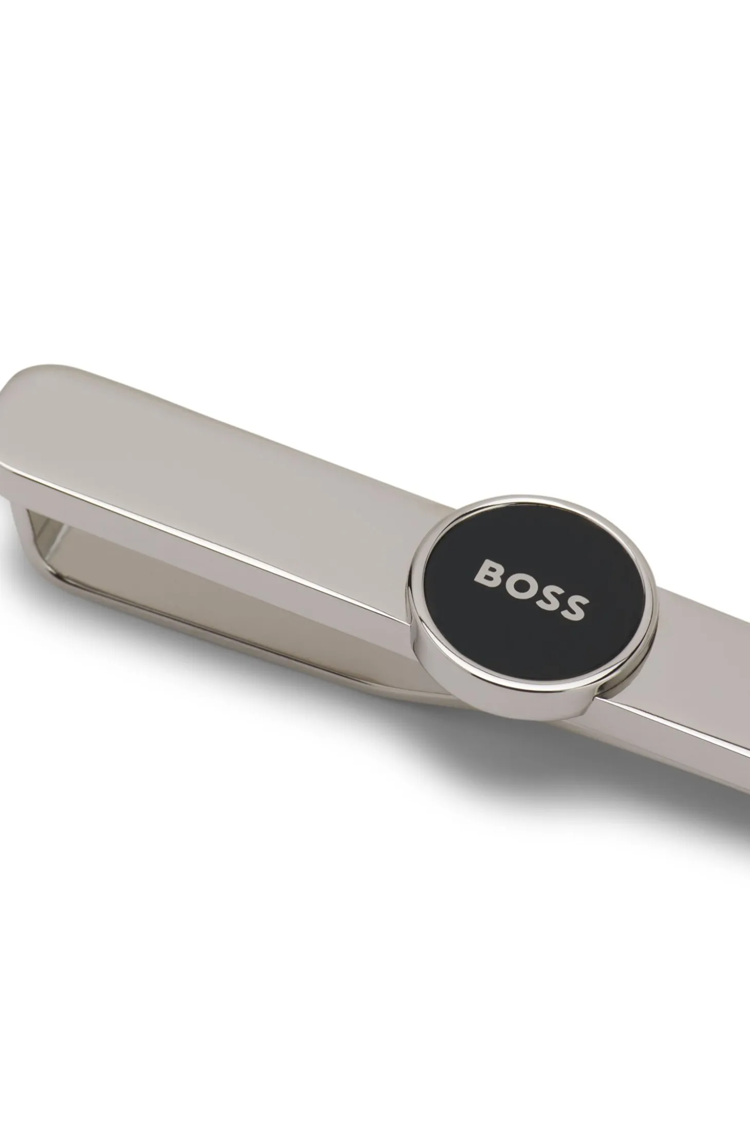 Brass tie clip with round logo detail