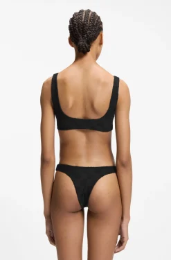 Brazilian bikini bottoms in stretch terry with stacked logos