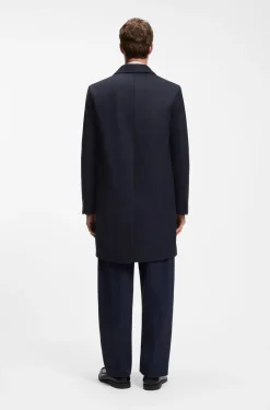 Buttoned coat in a virgin-wool blend