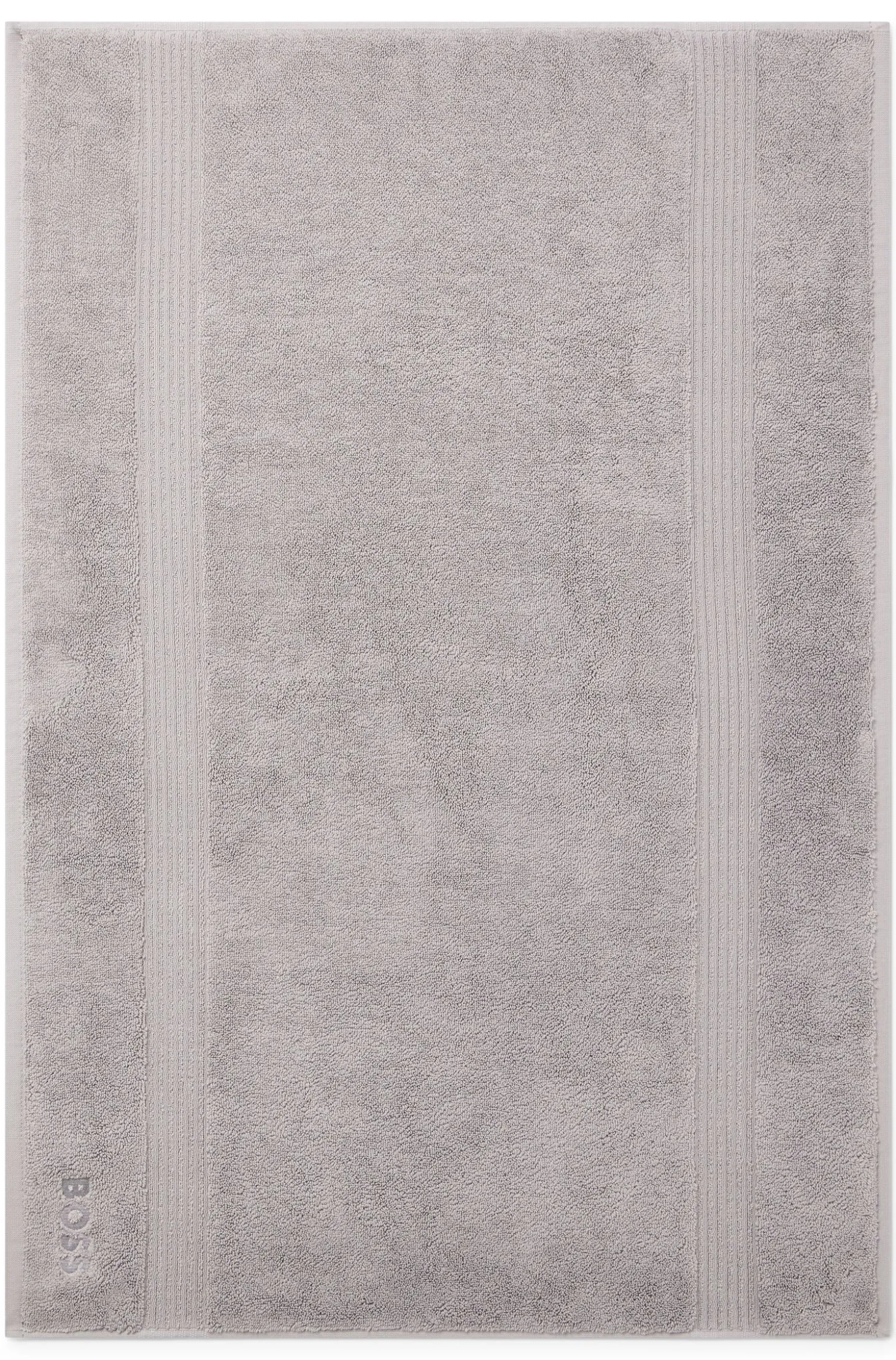 Cotton bath mat in silver with embroidered logo