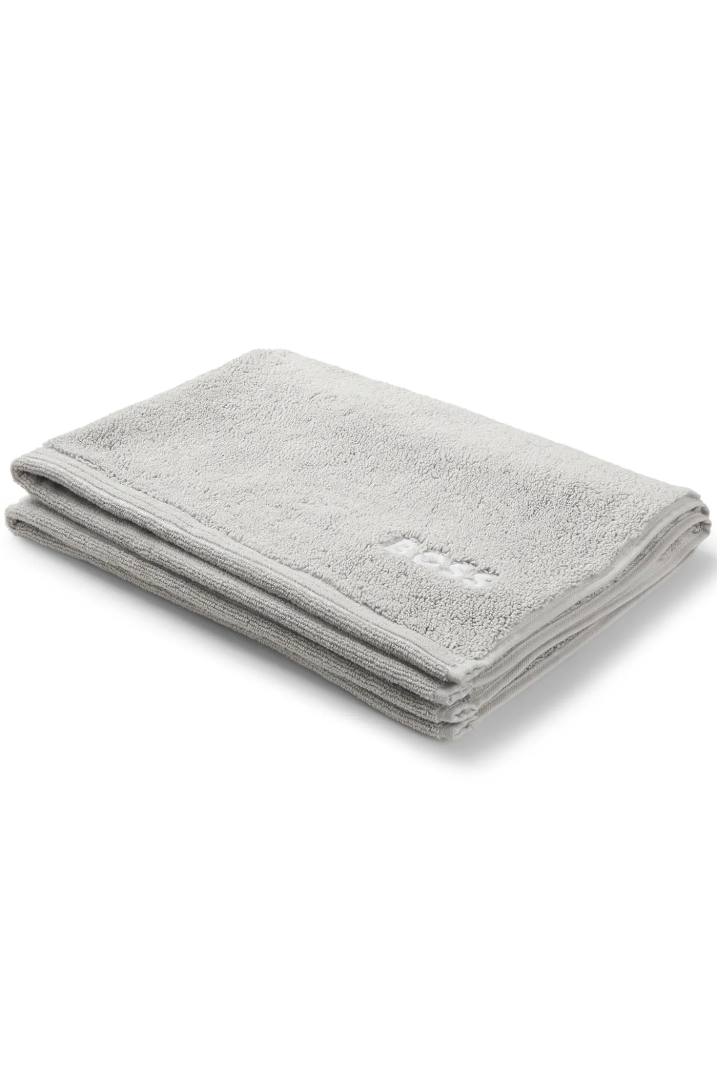 Cotton bath mat with contrast embroidered logo