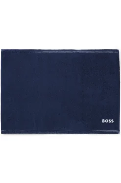 Cotton bath mat with contrast embroidered logo