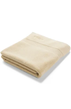 Cotton bath mat with embroidered logo