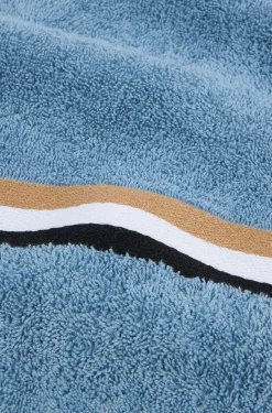 Cotton bath towel with signature-stripe border