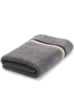 Cotton bath towel with signature-stripe border