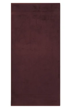 Cotton bath towel with tonal embroidered logo