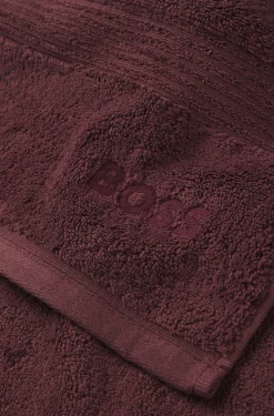 Cotton bath towel with tonal embroidered logo