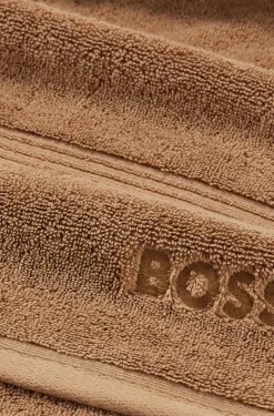 Cotton bath towel with tonal embroidered logo