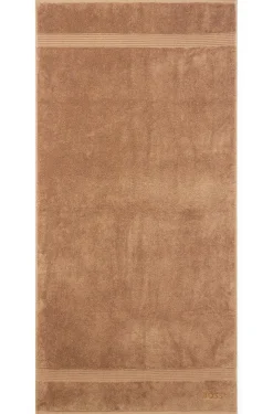 Cotton bath towel with tonal embroidered logo