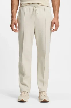 Cotton-blend tracksuit bottoms with tennis-themed logo
