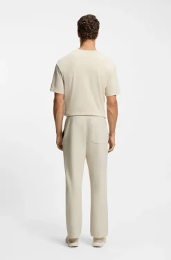 Cotton-blend tracksuit bottoms with tennis-themed logo