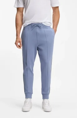 Cotton-blend tracksuit bottoms with piping details