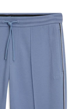 Cotton-blend tracksuit bottoms with piping details