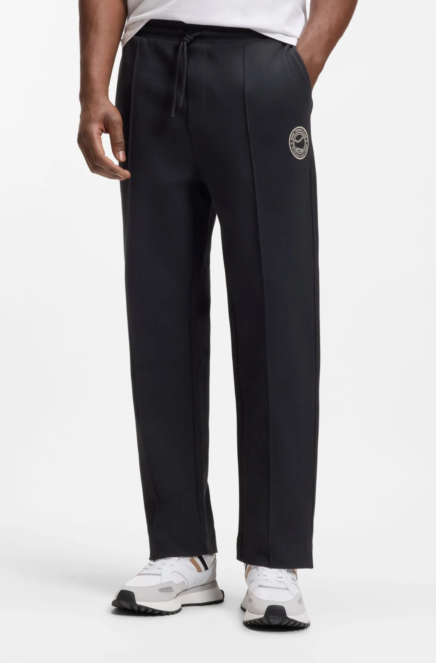 Cotton-blend tracksuit bottoms with tennis-themed logo