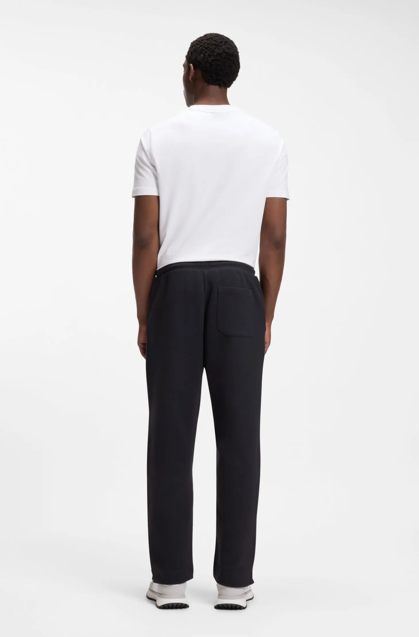 Cotton-blend tracksuit bottoms with tennis-themed logo