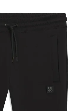 Cotton-blend tracksuit bottoms with stacked logo