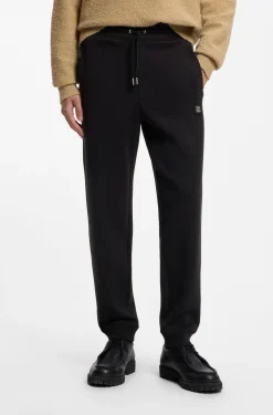 Cotton-blend tracksuit bottoms with stacked logo