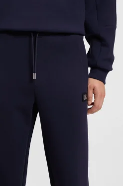 Cotton-blend tracksuit bottoms with stacked logo