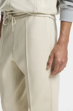 Cotton-blend tracksuit bottoms with piping details