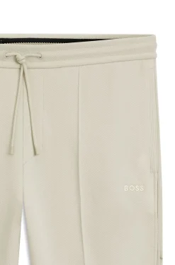 Cotton-blend tracksuit bottoms with piping details