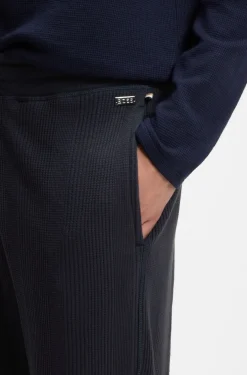 Cotton-blend tracksuit bottoms with waffle structure