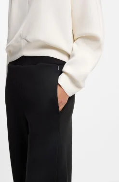 Cotton-blend tracksuit bottoms with lustrous piping