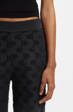 Cotton-blend tracksuit bottoms with all-over logo pattern