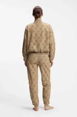 Cotton-blend tracksuit bottoms with all-over logo pattern
