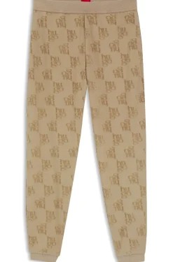 Cotton-blend tracksuit bottoms with all-over logo pattern