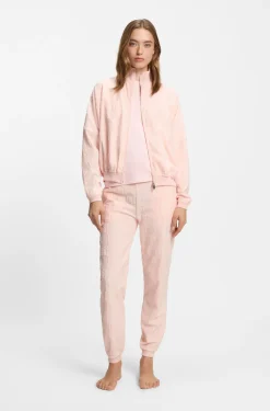 Cotton-blend tracksuit bottoms with all-over logo pattern