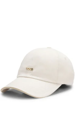 Cotton cap with metal logo lettering