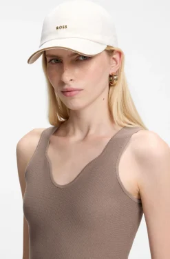 Cotton cap with metal logo lettering